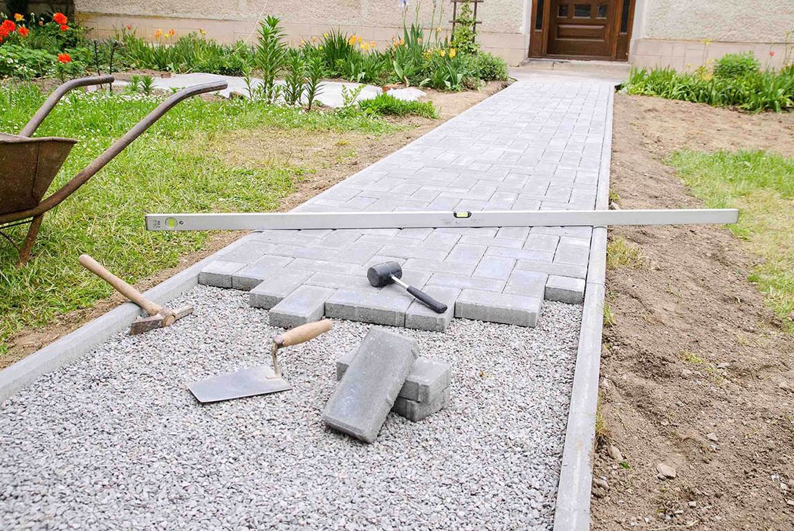 Drainage layer for permeable walkways with R34-RCA ¾” Concrete Aggregate 